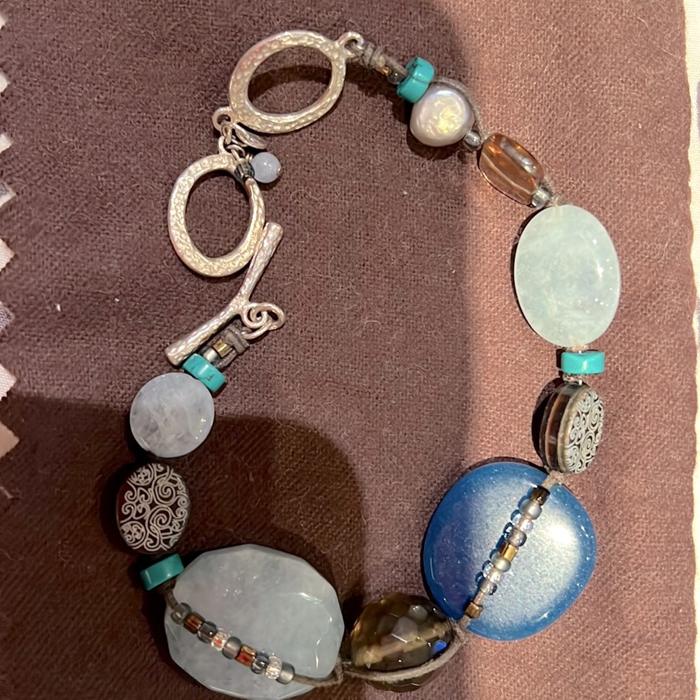 Silpada sterling silver, leather & bead toggle bracelet. 9 inches end to end.